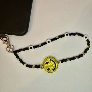 Cell phone wristlet from The Charm Hut works on any phone case